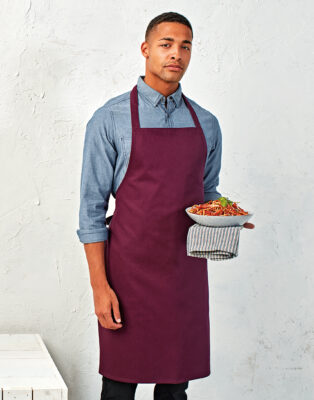 100% COTTON APRON - ORGANIC CERTIFIED - A kitchen apron made with 100% certified organic cotton, making for a really durable apron which is perfect for chef's teams and front of house staff. Available in 20 colours with self-fabric ties. Heavyweight absorbent cotton twill No pocket Self-fabric ties 100% Cotton - organic certified 240gsm Industrial laundering at 85c. Domestic wash at 60c